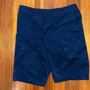 Golf shorts, navy color by Under Armour in excellent condition